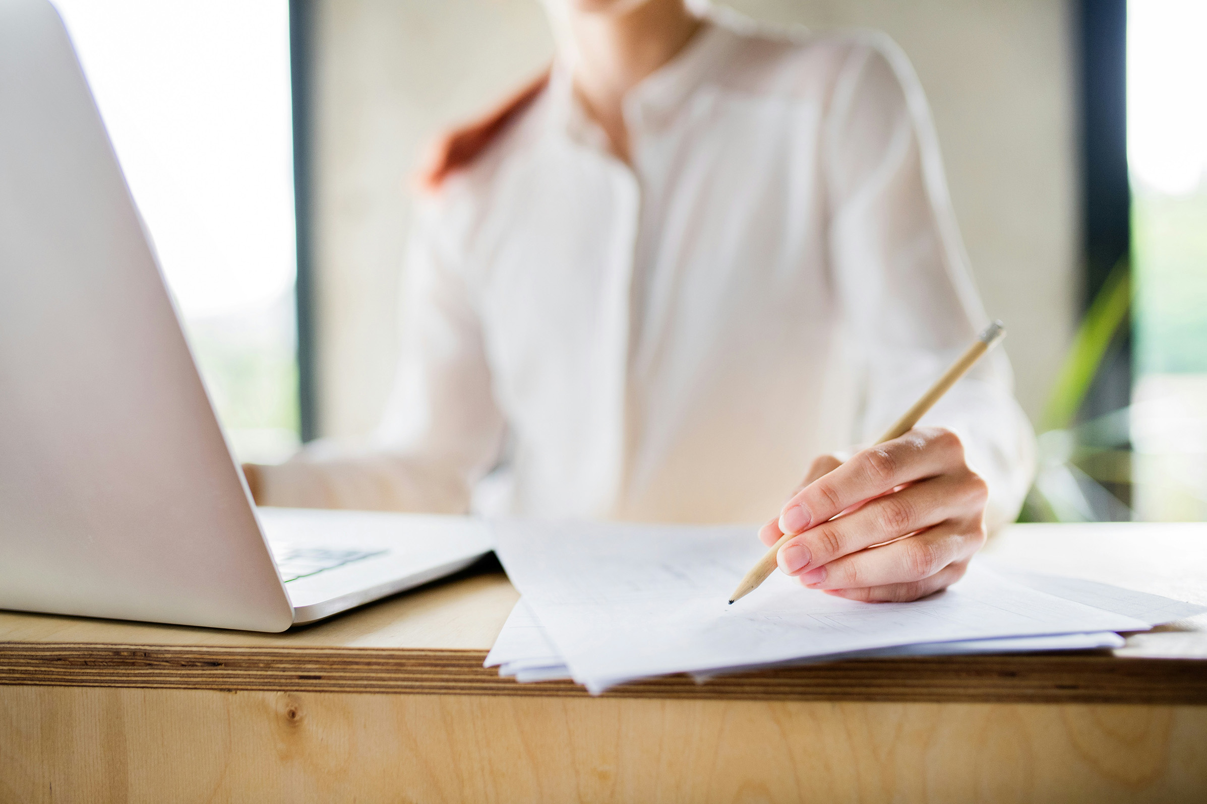 Reviewing documents at a desk